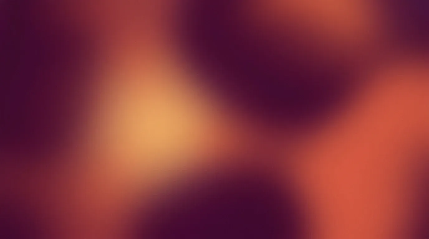 Plum and coral heavily blurred color fields with fine grain